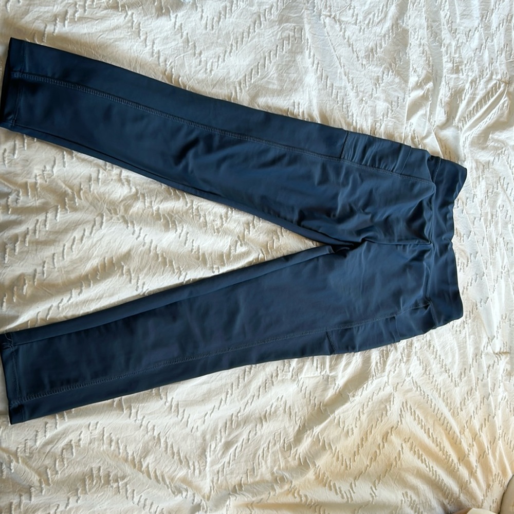 Runway quick dry moisture wicking leggings good condition two very little stains